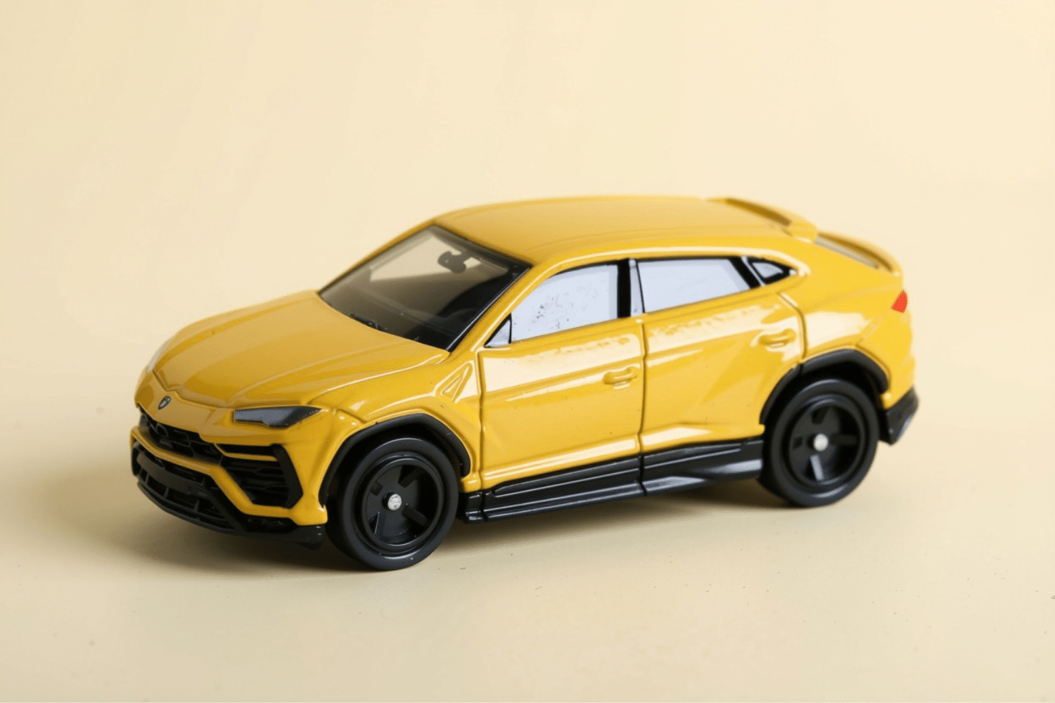 MYF Business Vehicle Sourcing and Finance - image of a yellow toy car on a cream background